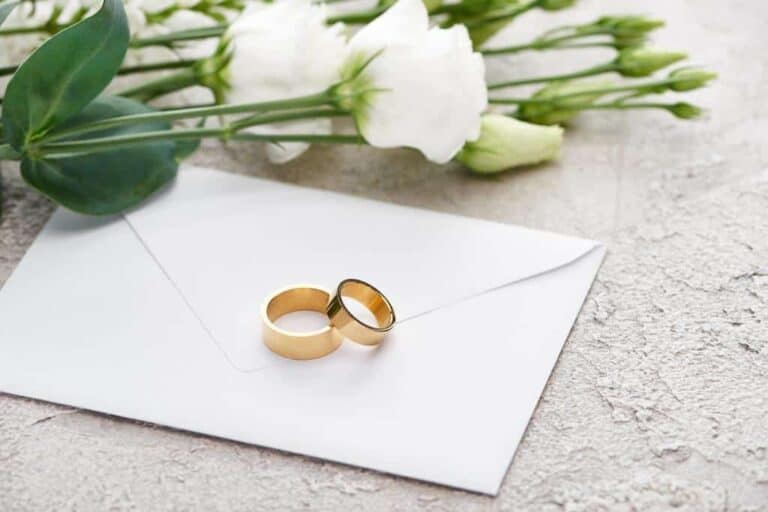 Stock photo golden wedding rings envelope white Hochzeit Mallorca